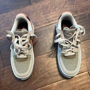 Multi-color green Nike sneakers.